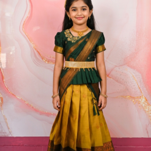 A traditional Indian Pattu Pavada lehenga in a vibrant Mustard Yellow with Green