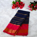 A deep Navy Blue (Body) contrasted with a vibrant Hot Pink/Crimson (Border and Pallu).